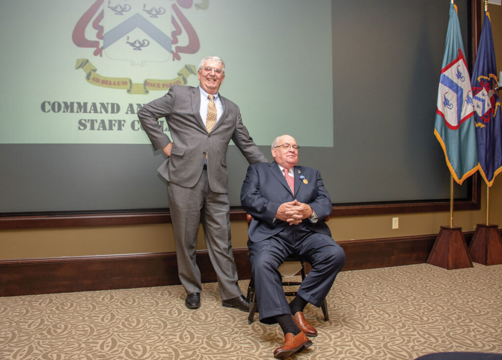 After a few laughs with a child-sized chair, all is right in the world again as Dr. Willbanks lays claim to his actual full-sized chair presented by the CGSC Foundation in recognition of his selection as CGSC Professor Emeritus.