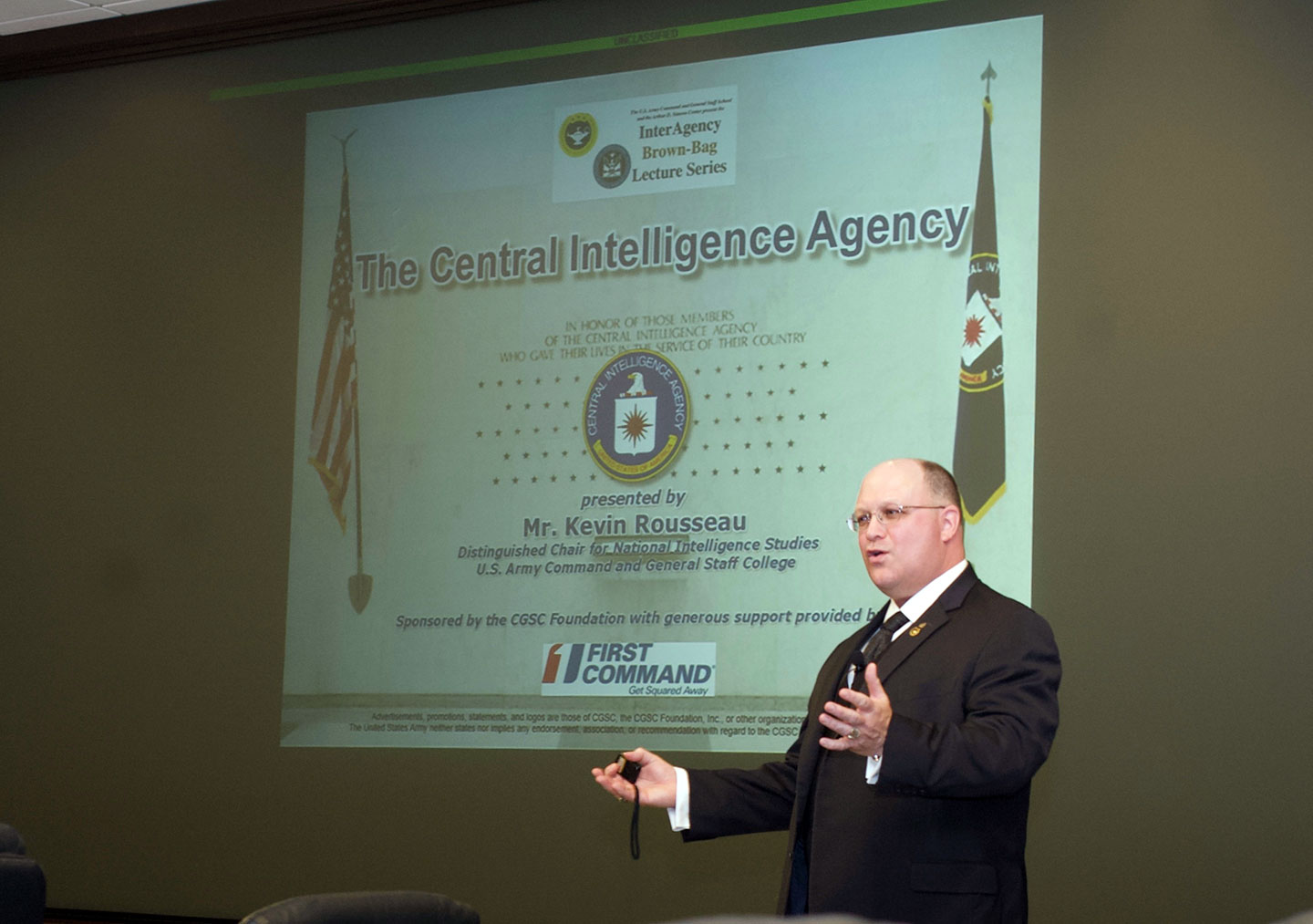 Photo of Kevin Rousseau, the CGSC Distinguished Chair for National Intelligence Studies and a member of the Central Intelligence Agency (CIA), delivering his presentation on the CIA in the latest the InterAgency Brown-Bag Lecture on April 3, in the in the Arnold Conference Room of the Lewis and Clark Center on Fort Leavenworth.