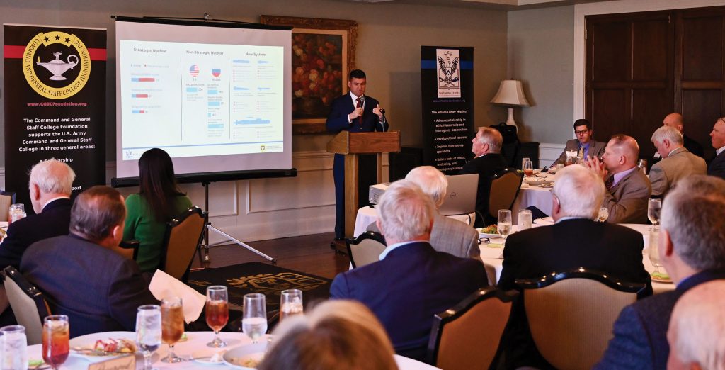 Retired Col. Matt Dimmic provides his presentation on Russian Military Capabilities for the Arter-Rowland National Security Forum luncheon event on March 17, 2022, at the Carriage Club in Kansas City.