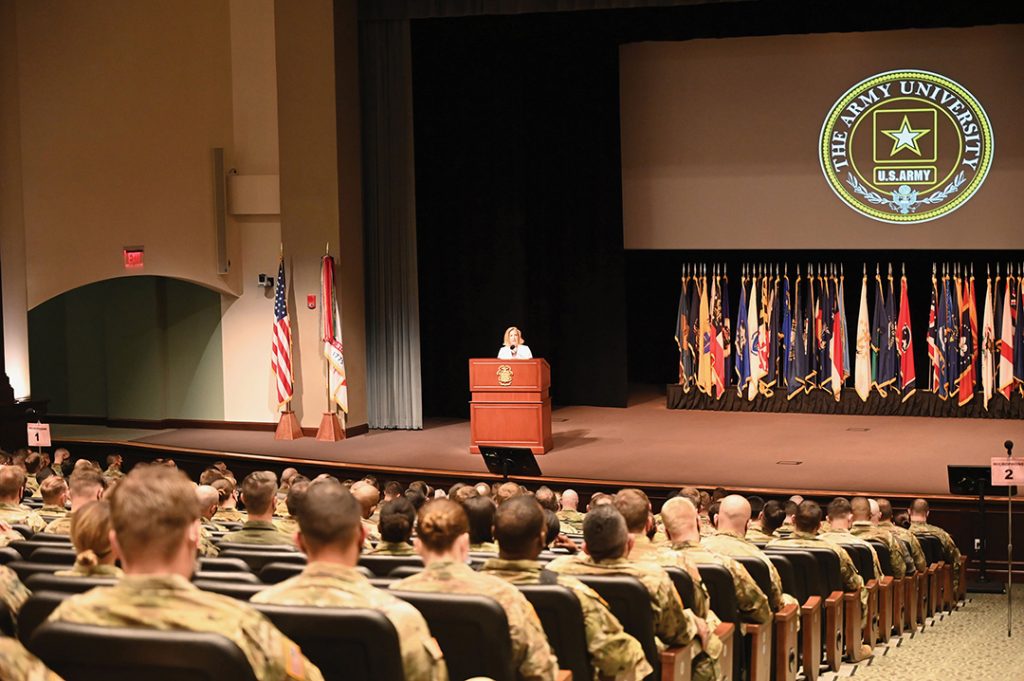 (Top photo and above) Secretary of the U.S. Army Christine Wormuth speaks to CGSC students, faculty and staff in in Eisenhower Auditorium at the Lewis and Clark Center during her visit to CGSC on March 21, 2022.