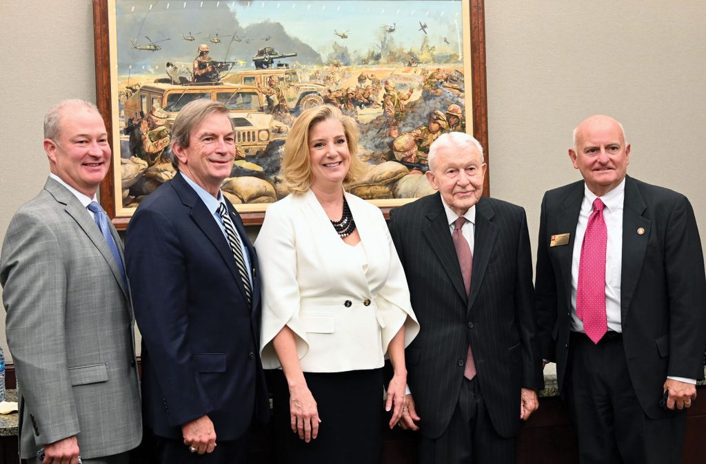 Secretary of the U.S. Army Christine Wormuth, center, takes a group photo with the Kansas delegation of Civilian Aides to the Secretary of the Army (CASA) during her visit to CGSC on March 21, 2022. From left: Patrick C. Warren, Greater Kansas City CASA; Michael D. Hockley, Kansas (East) CASA; Wormuth; former Kansas East CASA, now CASA Emeritus, Lt. Gen. (Ret.) Robert Arter; and D. Scott Stuckey, Kansas (West) CASA.