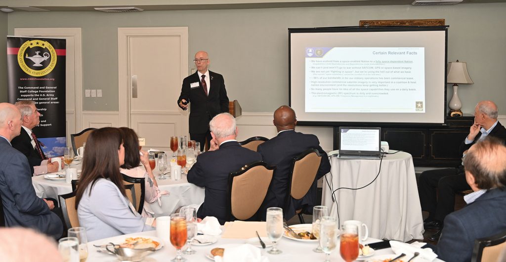 Thomas A. Gray, the U.S. Army Space and Missile Defense Command’s liaison officer to the U.S. Army Combined Arms Center and Army University at Fort Leavenworth, delivers his presentation on the Domain of Space and National Security for the Arter-Rowland National Security Forum luncheon event on April 21, 2022, at the Carriage Club in Kansas City.