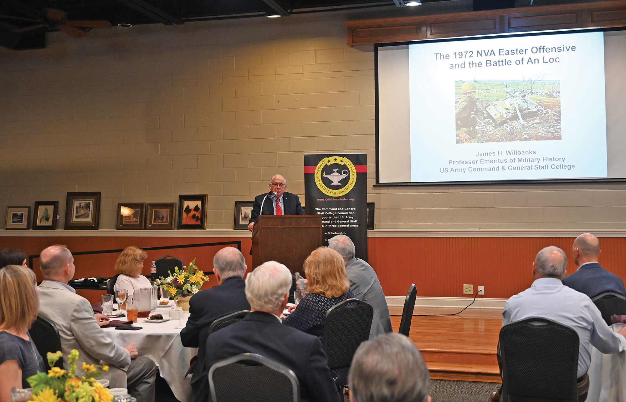 Dr. James H. Willbanks, Professor Emeritus and former General of the Army George C. Marshall Chair of Military History at the U.S. Army Command and General Staff College and decorated Vietnam War veteran, presents the 14th lecture in the CGSC Foundation's Vietnam War Commemoration Lecture Series on May 12, 2022, at June's Northland in downtown Leavenworth, Kansas.