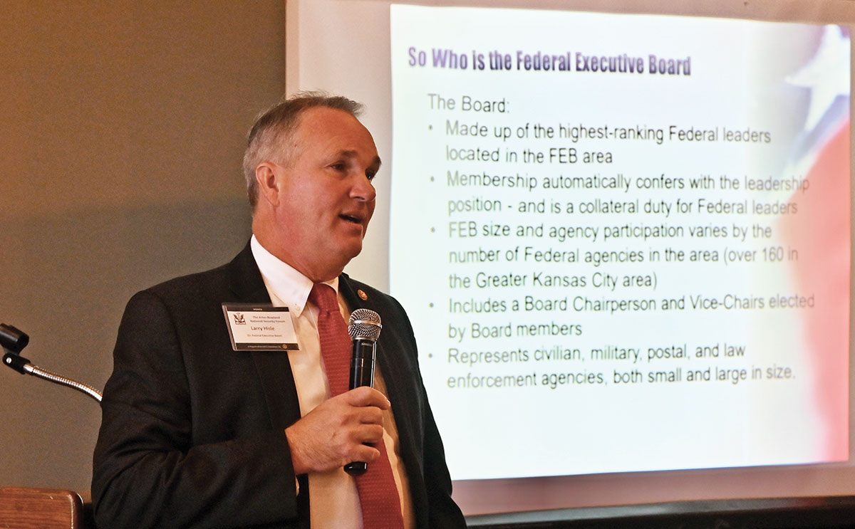 Larry A. Hisle, executive director of the Greater Kansas City Federal Executive Board (FEB), provides a presentation on the roles and missions of the Greater Kansas City Federal Executive Board to members of the Arter-Roland National Security Forum on Nov. 17, 2022, at the Carriage Club in Kansas City.