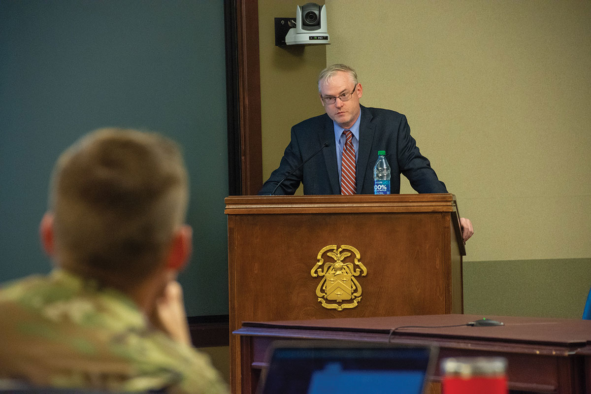 Terry D. Mobley, Diplomacy Chair, U.S. Army Command and General Staff College, leads the discussion about the U.S. Department of State and Foreign Service Officers during the InterAgency Brown-Bag Lecture on Nov. 15, 2022, in the Arnold Conference Room of the Lewis and Clark Center on Fort Leavenworth.