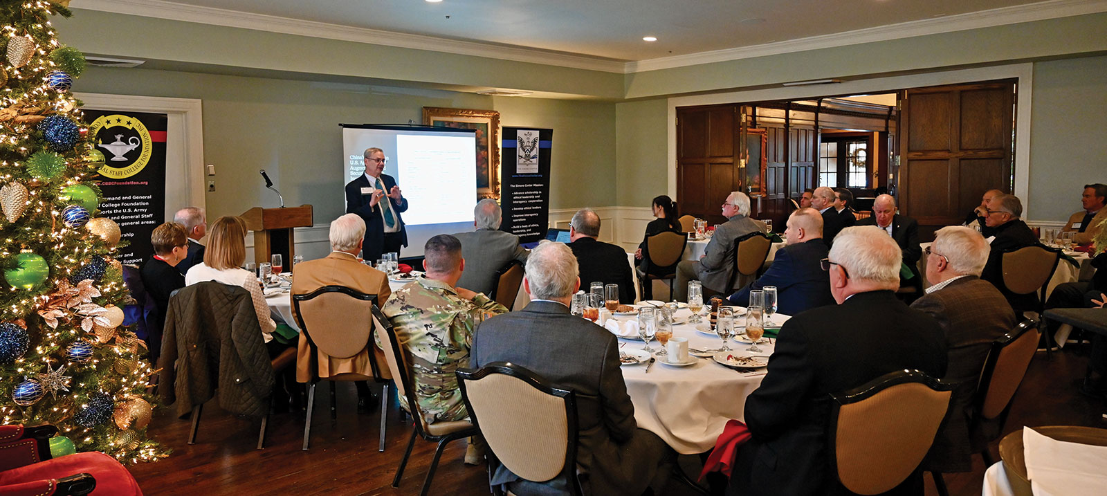 Dr. Allen M. Featherstone, professor and head of Kansas State University’s Agricultural Economics Department, delivers a presentation entitled "Foreign Ownership of U.S. Food and Agricultural Assets" to members of the Arter-Rowland National Security Forum at a luncheon event on Dec. 1, 2022, at the Carriage Club in Kansas City.