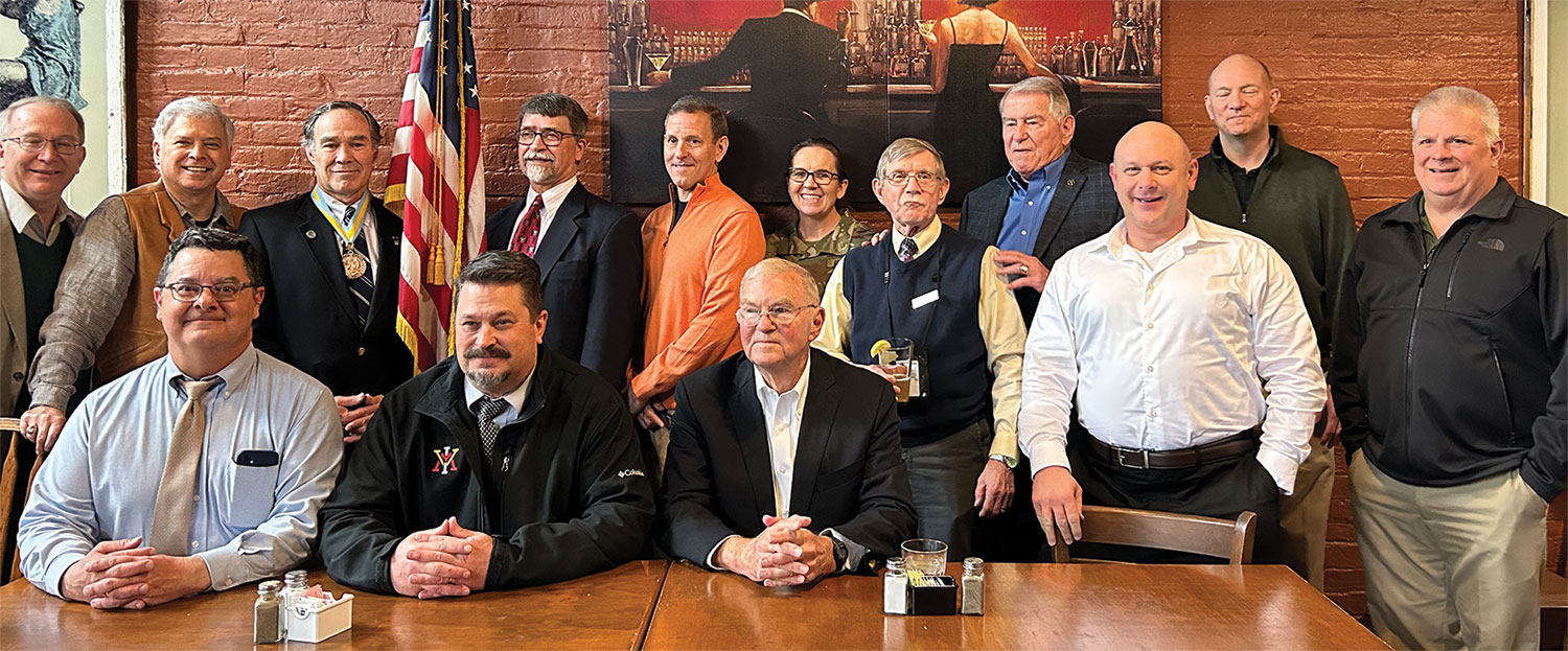 Ambassador (Ret.) David Miller, seated at right, attends a meeting of the Fort Leavenworth-Roger Donlon Chapter of thecForeign Area Officers Association on March 23, 2023, in downtown Leavenworth, Kansas.