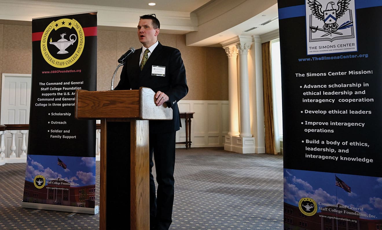 ARNSF FEB w Lt. Col. (Ret.) Brian L. Steed, Ph.D., associate professor of military history at the U.S. Army Command and General Staff College at Fort Leavenworth, Kansas, provides a presentation on the Middle East during the Arter-Rowland National Security Forum luncheon event on Feb. 15, 2024, at the Carriage Club in Kansas City.