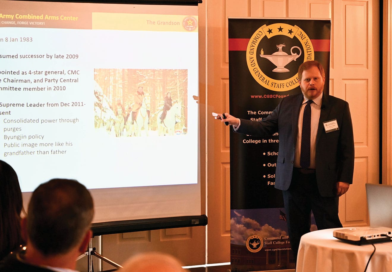 ARNSF APR w Dr. James E. Platte, assistant professor at the U.S. Army School of Advanced Military Studies at Fort Leavenworth, Kansas, provides a presentation on North Korea during the Arter-Rowland National Security Forum luncheon event on April 11, 2024, at the Carriage Club in Kansas City.