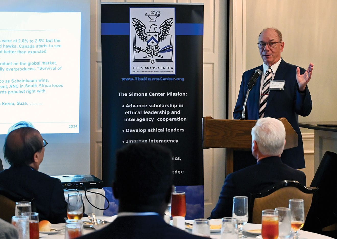 ARNSF JUN w Dr. Chris Kuehl, one of the founders and managing partners of Armada Corporate Intelligence in Lawrence, Kansas, provides a presentation entitled "The Economic Impact of Global Conflict" during the Arter-Rowland National Security Forum luncheon event on June 13, 2024, at the Carriage Club in Kansas City.