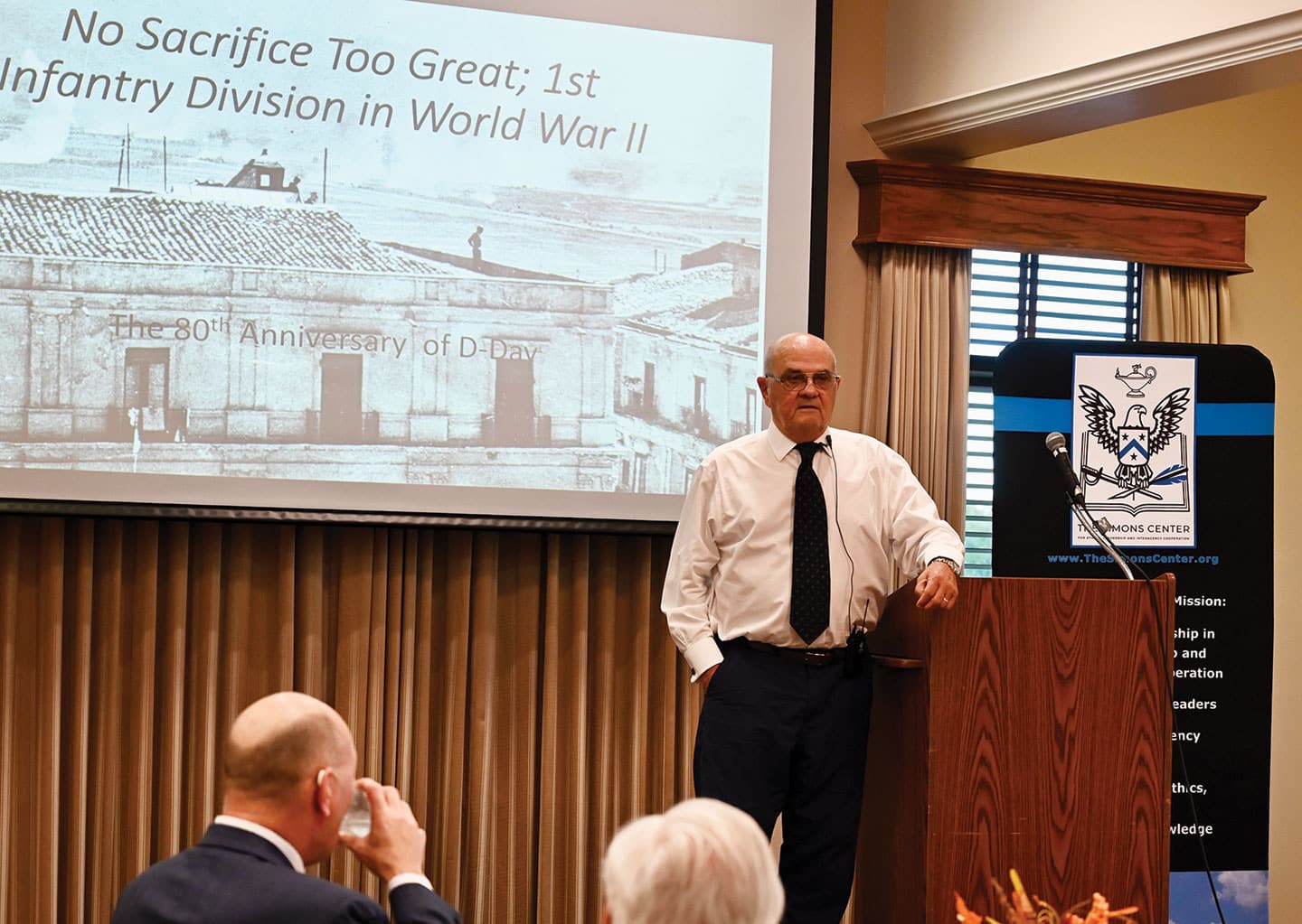 DSS w Colonel (Ret.) Greg Fontenot delivers his presentation on the U.S. Army's 1st Infantry Division experiences in WWII that he researched and wrote about in his recently published book "No Sacrifice Too Great" during the Distinguished Speaker Series event hosted by the CGSC Foundation and its Simons Center at the Riverfront Community Center in downtown Leavenworth, Kansas on Sept. 26, 2024.