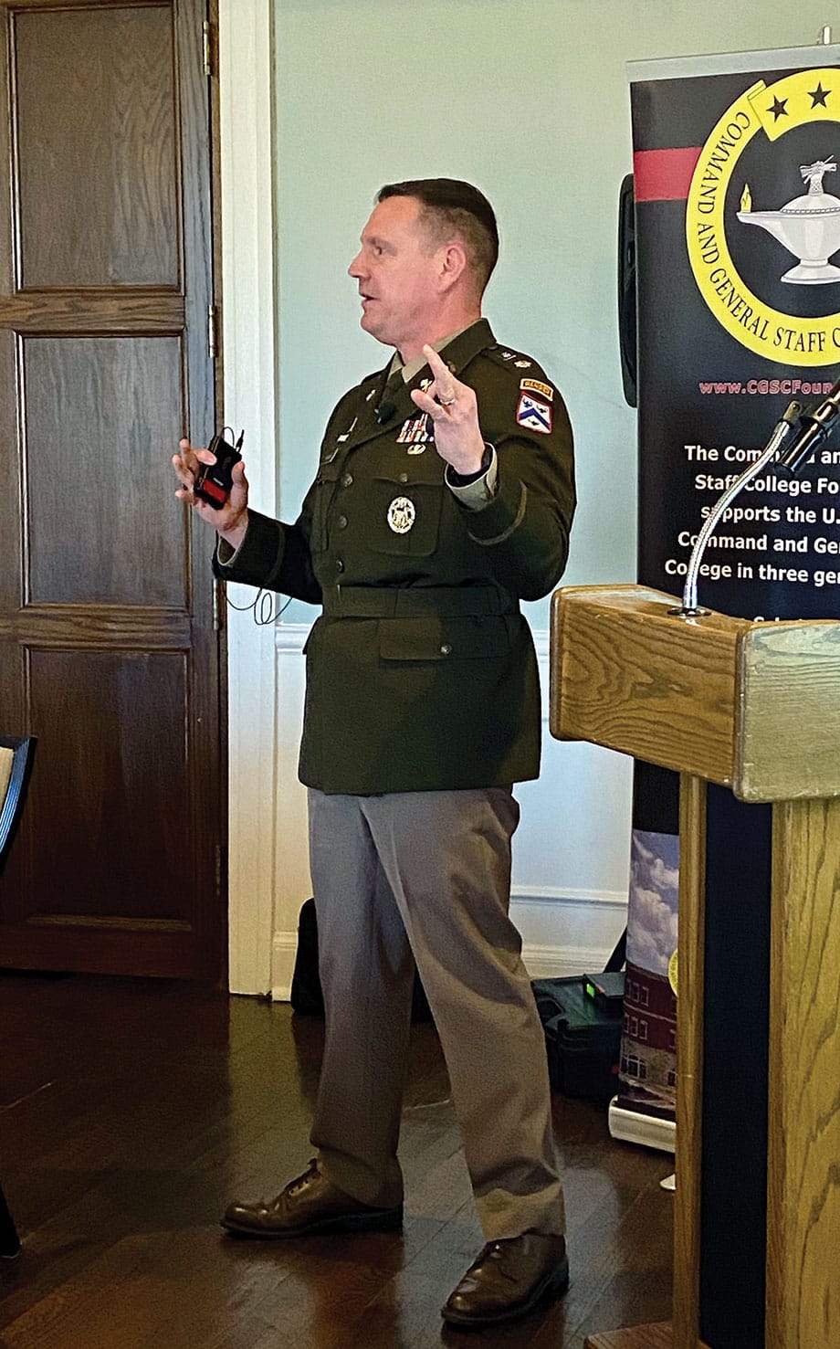 ARNSF MAR w Lt. Col. Jason Halub, a U.S. Army Foreign Area Officer currently studying at the U.S. Army School for Advanced Military Studies at Fort Leavenworth, Kansas, provides a presentation on China during the Arter-Rowland National Security Forum luncheon event on March 20, 2025, at the Carriage Club in Kansas City.