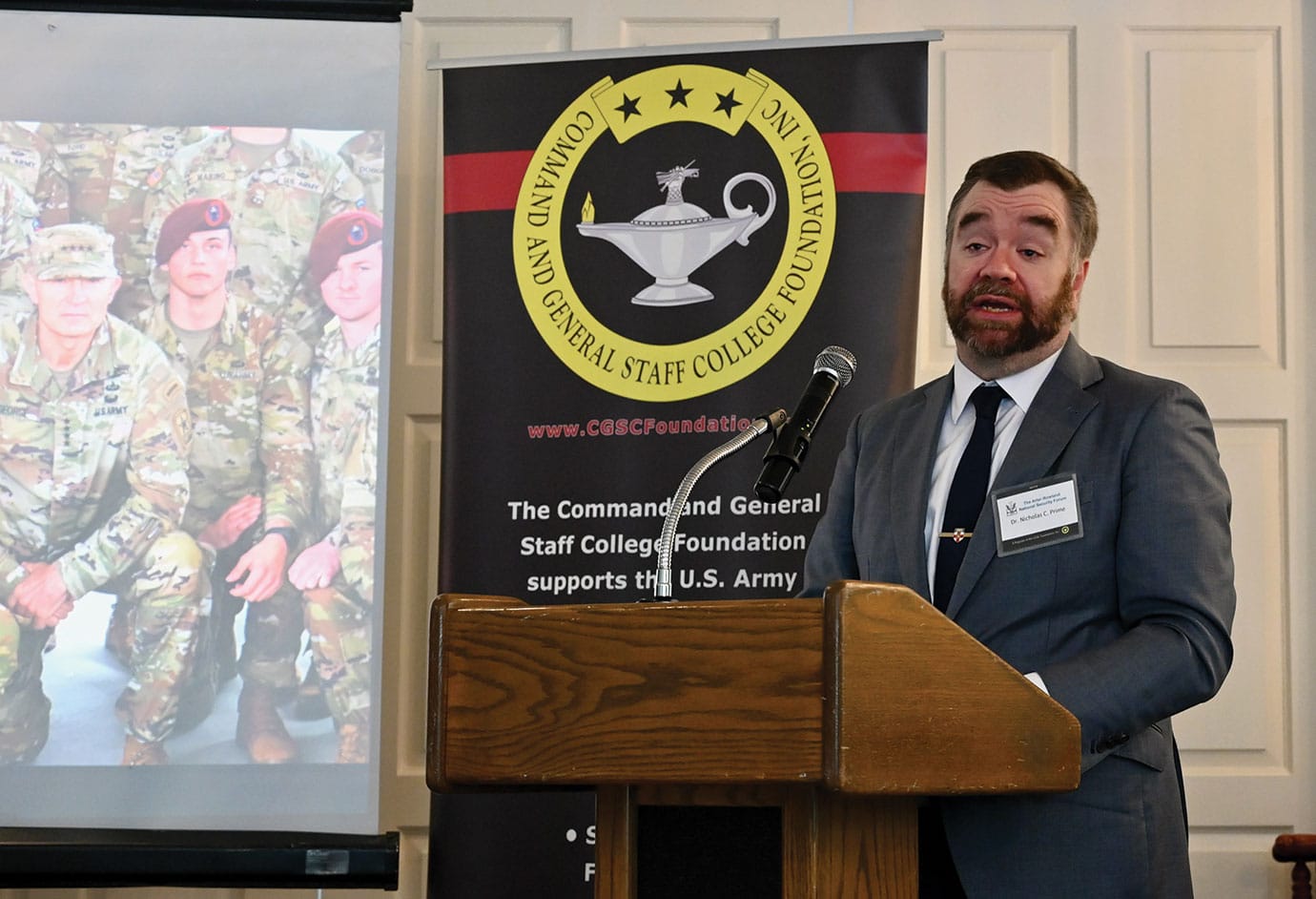 ARNSF JUN w Nicholas Prime, Ph.D., from the School of Advanced Military Students at Fort Leavenworth, Kansas, provides a presentation on "contemporary generalship" during the Arter-Rowland National Security Forum luncheon event on June 19, 2025, at the Carriage Club in Kansas City.