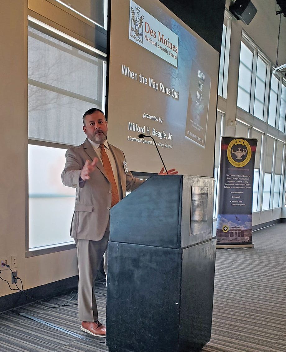 DMNSF w Simons Center Director Todd Schmidt welcomes attendees to the Des Moines National Security Forum at the Des Moines Embassy Club West in West Des Moines, Iowa on March 25, 2026.