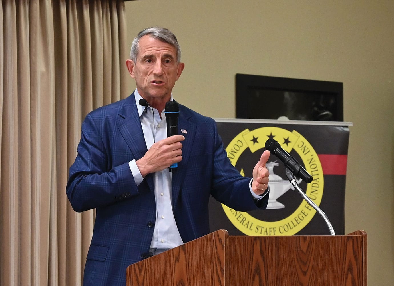 DSS w Maj. Gen. (Ret.) William Hickman, a veteran with extensive NATO experience, conducts a presentation and discussion about NATO during during the Distinguished Speaker Series event hosted by the CGSC Foundation and its Simons Center at the Riverfront Community Center in downtown Leavenworth, Kansas on April 15, 2026.