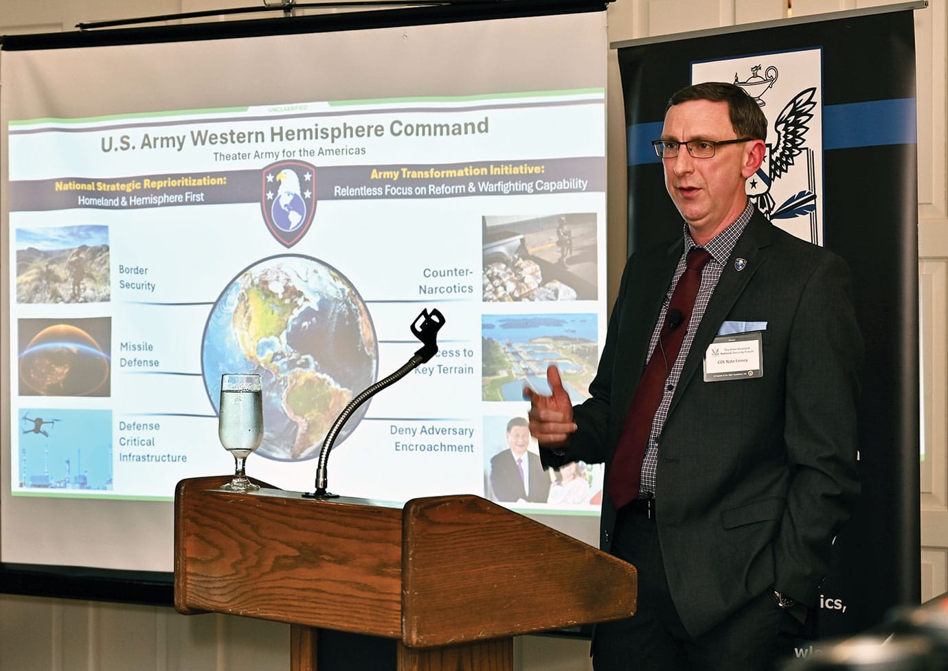 ARNSF w Army Strategist Col. Nathan K. Finney, provides members of the Arter-Rowland National Security Forum with a briefing on the establishment of the U.S. Army Western Hemisphere Command, the U.S. Army’s newest Theater Army/Army Service Component Command, during an ARNSF luncheon event at the Carriage Club in Kansas City on June 18, 2026.